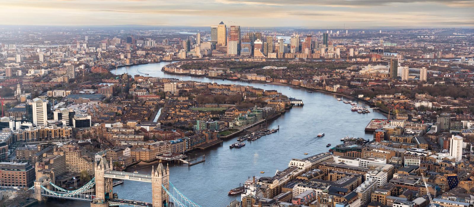 View over London: from the Tower Bridge along the Thames to Canary Wharf 